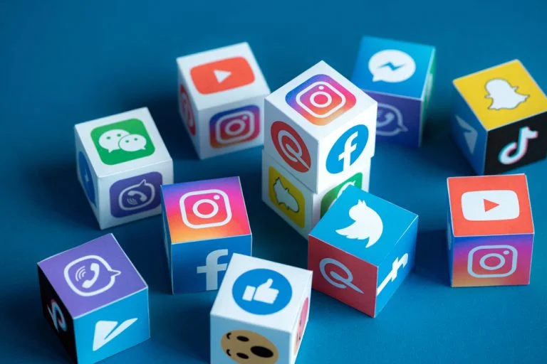 Blog 1 Different social media platform logos on cubes.