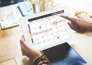 An example of a social media marketing calender on an iPad screen.