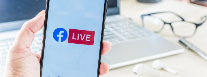 Example of someone watching facebook live on their mobile phone.