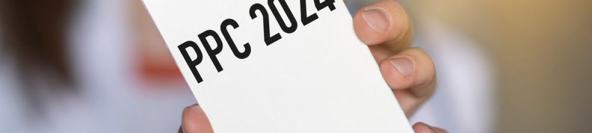 PPC written on a notepad, which is being held up by a woman.