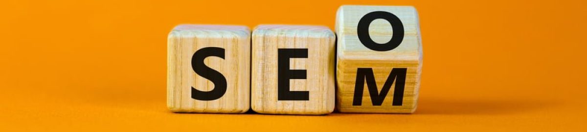 Wooden cubes turning and showing SEO and SEM