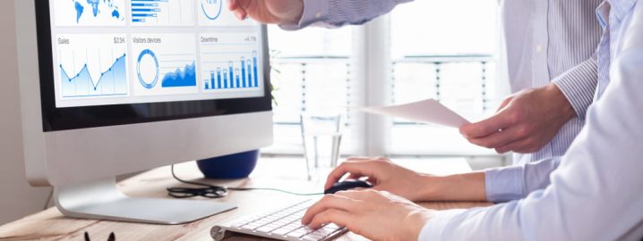 Team of business people discussing digital marketing metrics report and return on investment strategy for advertisement campaign